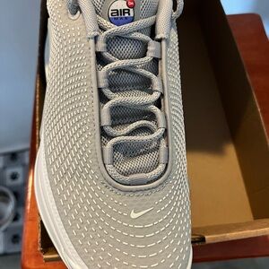 Nike Gray Running Shoes with Pink Sole Accent